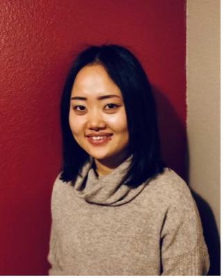 Portrait of Xiaoyan Zhou.